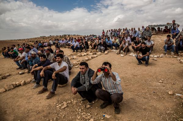 KURDS WATCH KOBANE SYRIA FIGHTING