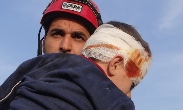 white-helmet-abdullah-rescues-child