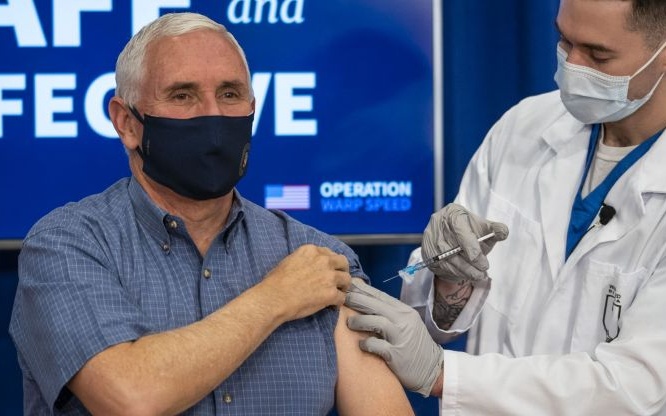 Coronavirus: FDA Approves Moderna Vaccine; New Daily Case Record; Stimulus Deal Held Up